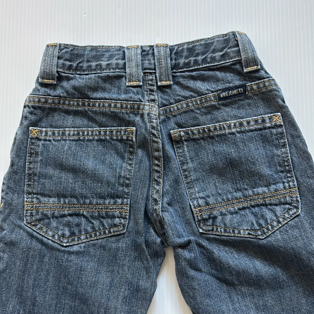 Wrangler 100% cotton, 5 pockets jeans.  Boys size 10 slim